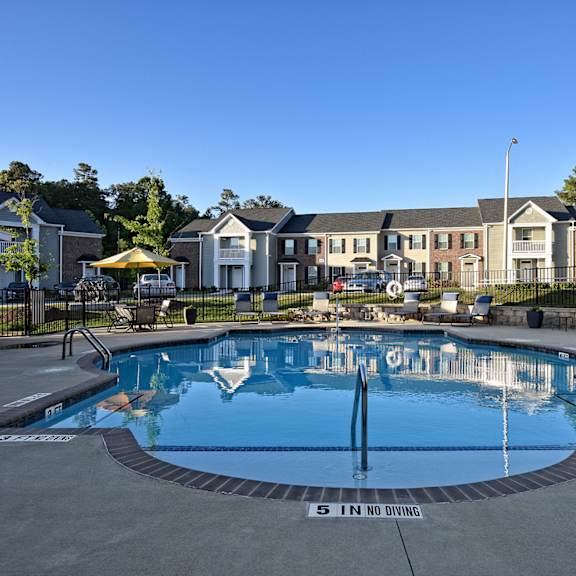 A swimming pool with the words "5 IN NO DIVING" written on the side.