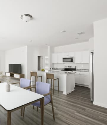 a living room and kitchen in a 555 waverly unit