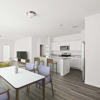 a living room and kitchen in a 555 waverly unit