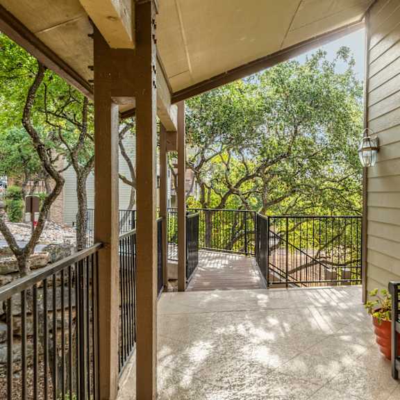 Building Exterior and Walkway at Westdale Creek Apartments in Austin, Texas, TX