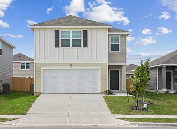 a house with a white garage door