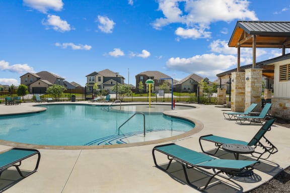 take a dip in the resort style pool at villas at houston levee west apartments