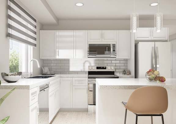 a kitchen with white cabinets and a white counter top