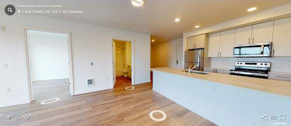 A kitchen with a stove top oven and a microwave. at Riverfront Everett, Washington, 98201