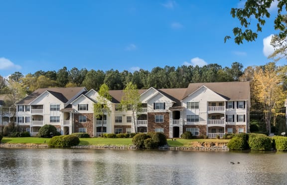 the view of the lake at the club at highland lakes apartments