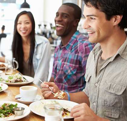 Friends dining out at Grand and Linden Family Apartments, South San Francisco