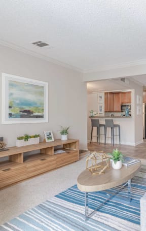a living room with a couch and a table at City View Apartments at Warner Center, Woodland Hills, CA 91367