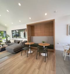 a living room and dining area with a couch and a table at Diablo Vista Apartments, Livermore