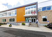 Thumbnail 15 of 21 - A building with the number 16 on it.
