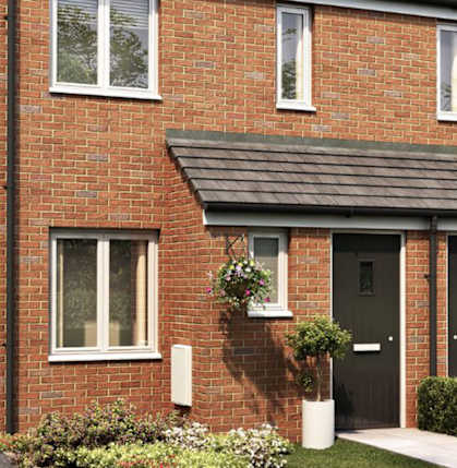 A red brick house with a black door and windows.