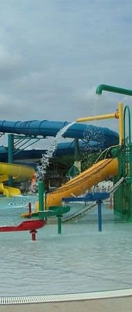 a water park with a large water slide
