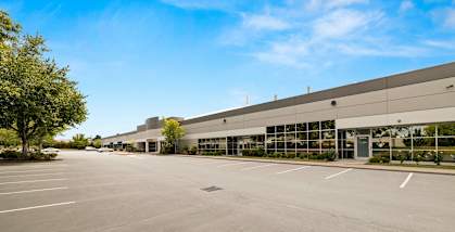 Sunset West Business Park office exteriors and parking lot
