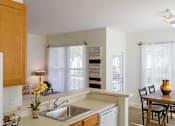 Thumbnail 7 of 16 - Avenel at Montgomery Square - Staged kitchen and dining