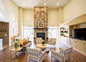 Thumbnail 11 of 16 - Avenel at Montgomery Square - Resident clubhouse with fireplace