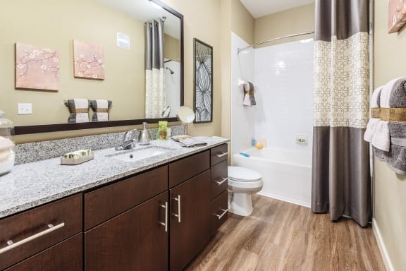 Nona Park Village Apartments pool area garden tubs with ceramic tile