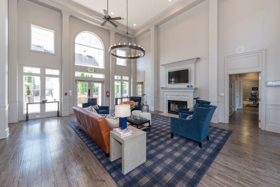 Swift Creek Commons Apartments - Resident clubhouse with fireplace