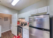 Thumbnail 16 of 22 - Evergreen Lenox Park Apartments interior kitchen