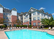 Thumbnail 3 of 16 - Avenel at Montgomery Square - Resort-style swimming pool with sundeck