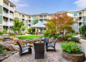 Thumbnail 12 of 18 - Parc at Grandview Apartments outdoor lounge area