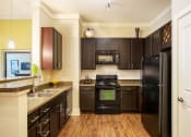 Thumbnail 16 of 18 - Parc at Grandview Apartments interior kitchen