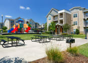 Thumbnail 11 of 18 - Glenbrook Apartments picnic area near playground