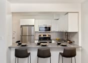 Thumbnail 4 of 12 - 910 Penn - Stainless steel appliances in select units