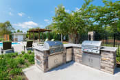 Thumbnail 4 of 18 - Glenbrook Apartments charcoal grills and picnic areas throughout
