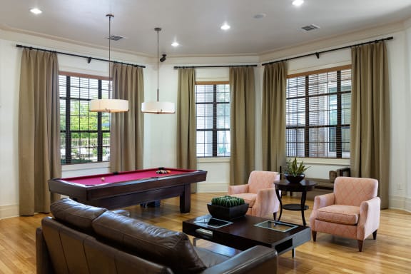 DeLayne at Twin Creeks clubhouse social room with billiards