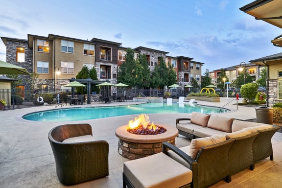 Acadia at Cornerstar Apartments - Poolside fire pit