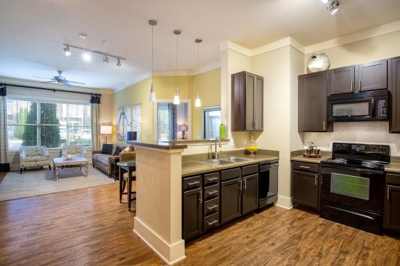 Parc at Grandview Apartments unit interior of living room and kitchen