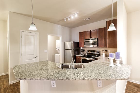 Glenbrook Apartments granite kitchen and bath countertops