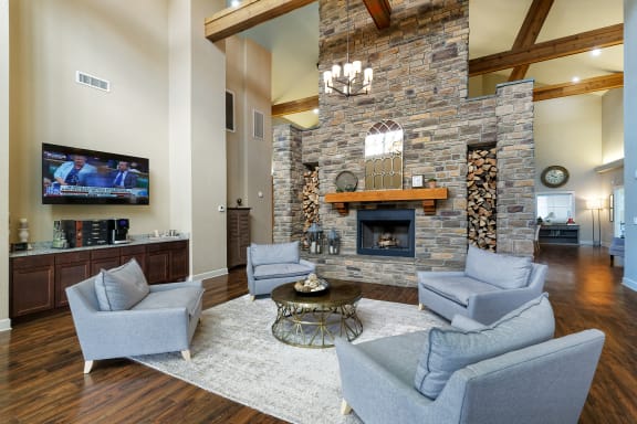 Glenbrook Apartments clubhouse resident lounge with fireplace and coffee bar