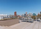 Thumbnail 4 of 15 - Harbor Hill Apartments rooftop lounge
