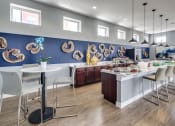 Thumbnail 9 of 15 - Urban Green Apartments clubhouse kitchen