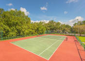 Thumbnail 4 of 18 - Versant Place Apartments outdoor tennis court