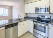 Thumbnail 11 of 16 - La Costa Apartments stainless steel appliance and granite countertop packages available