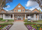 Thumbnail 1 of 18 - Lodge at Cypresswood Apartments - Leasing office entrance
