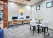 Thumbnail 6 of 18 - Lodge at Cypresswood Apartments - Business center with Mac and PC computers