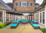 Thumbnail 11 of 18 - Lodge at Cypresswood Apartments - Poolside lounge