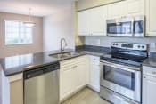 Thumbnail 11 of 16 - La Costa Apartments stainless steel appliance and granite countertop packages available