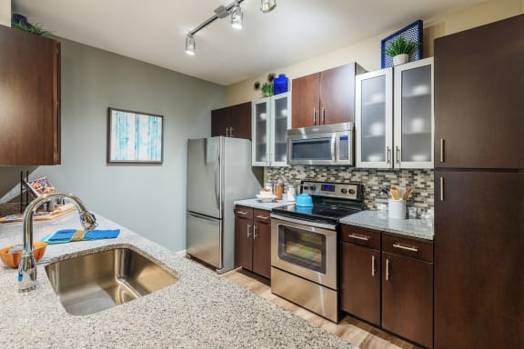 Nona Park Village Apartments - gourmet kitchens with granite countertops