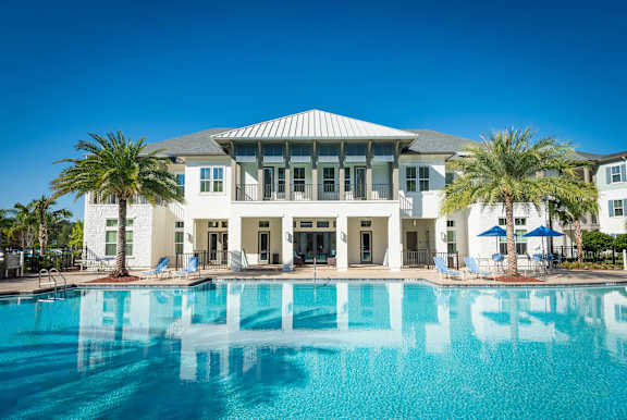 take a dip in the resort style pool at Alaqua Apartments, Florida, 32258