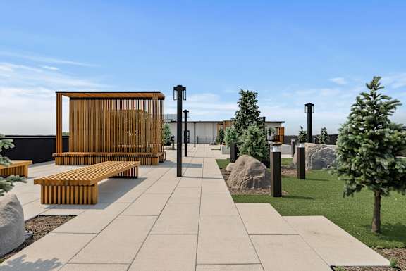 A modern outdoor seating area with benches and a wooden structure.