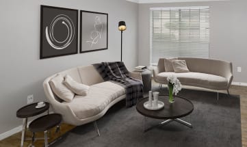 Model living room at Aspen Court Apartment Homes in Arlington , TX.