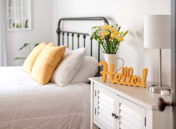 Bedroom with a bed at The Groves Apartments, Raleigh