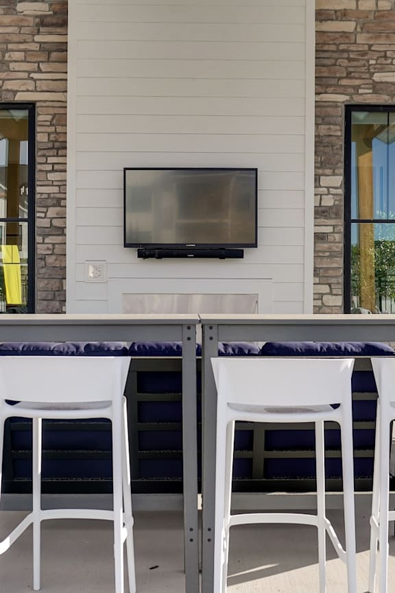 Community entrance and parking area at Wildwood Lakeville Apartments, Lakeville