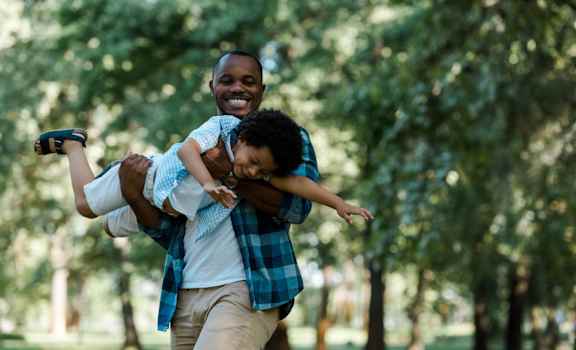Father and son playing in the park at Mainstreet Apartments, Clearwater, Florida 33756
