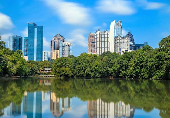 Lake Clara Meer at Peidmont Park with Atlanta skyline in the background at Ashley Auburn Pointe in Atlanta, GA