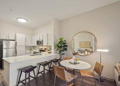 Dining Area and Kitchen  at Gramercy on the Park in Dallas, 75287