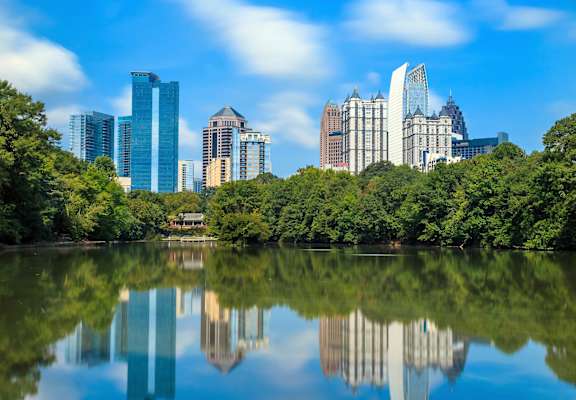 Lake Clara Meer at Peidmont Park with Atlanta skyline in the background in Atlanta, GA